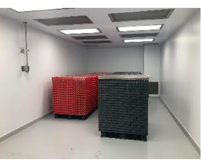 A room with red and black crates